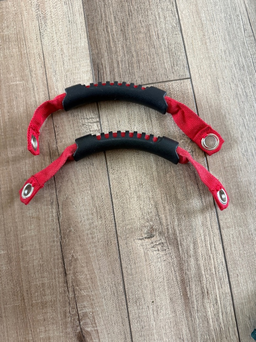red grab handles typically used for Jeep Wrangler roll bars